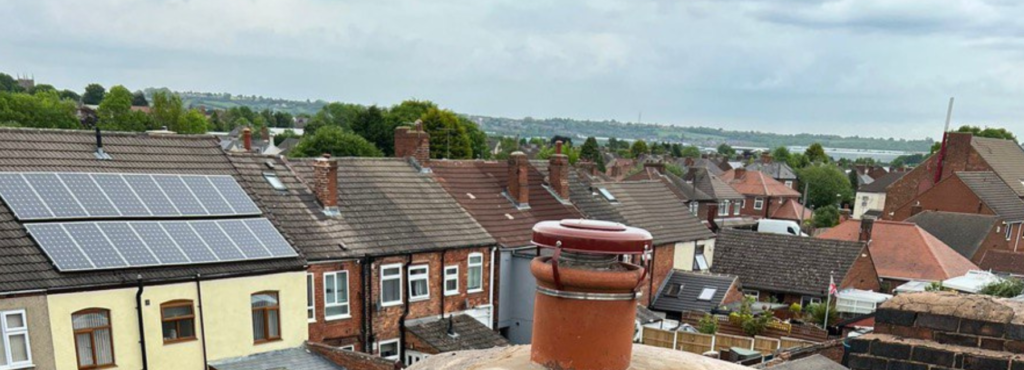This is a photo taken from a roof which is being repaired by LJ Roofing Royal Wootton Bassett, it shows a street of houses, and their roofs