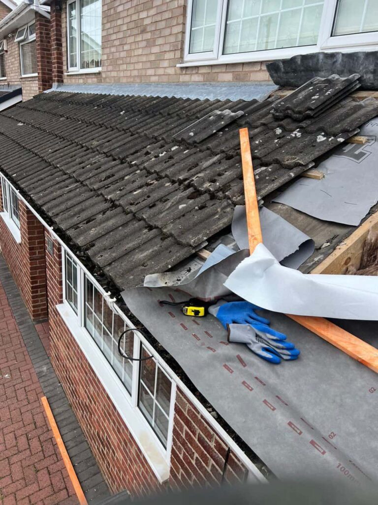 This is a photo of a pitched roof which is being repaired. The existing roof was leaking badly. Works carried out by LJ Roofing Royal Wootton Bassett