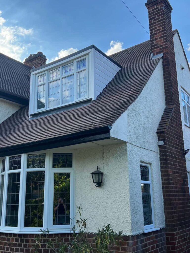 This is a photo of a dormer window which has just had some repairs carried out where the roof and the dormer meet. Works carried out by LJ Roofing Royal Wootton Bassett